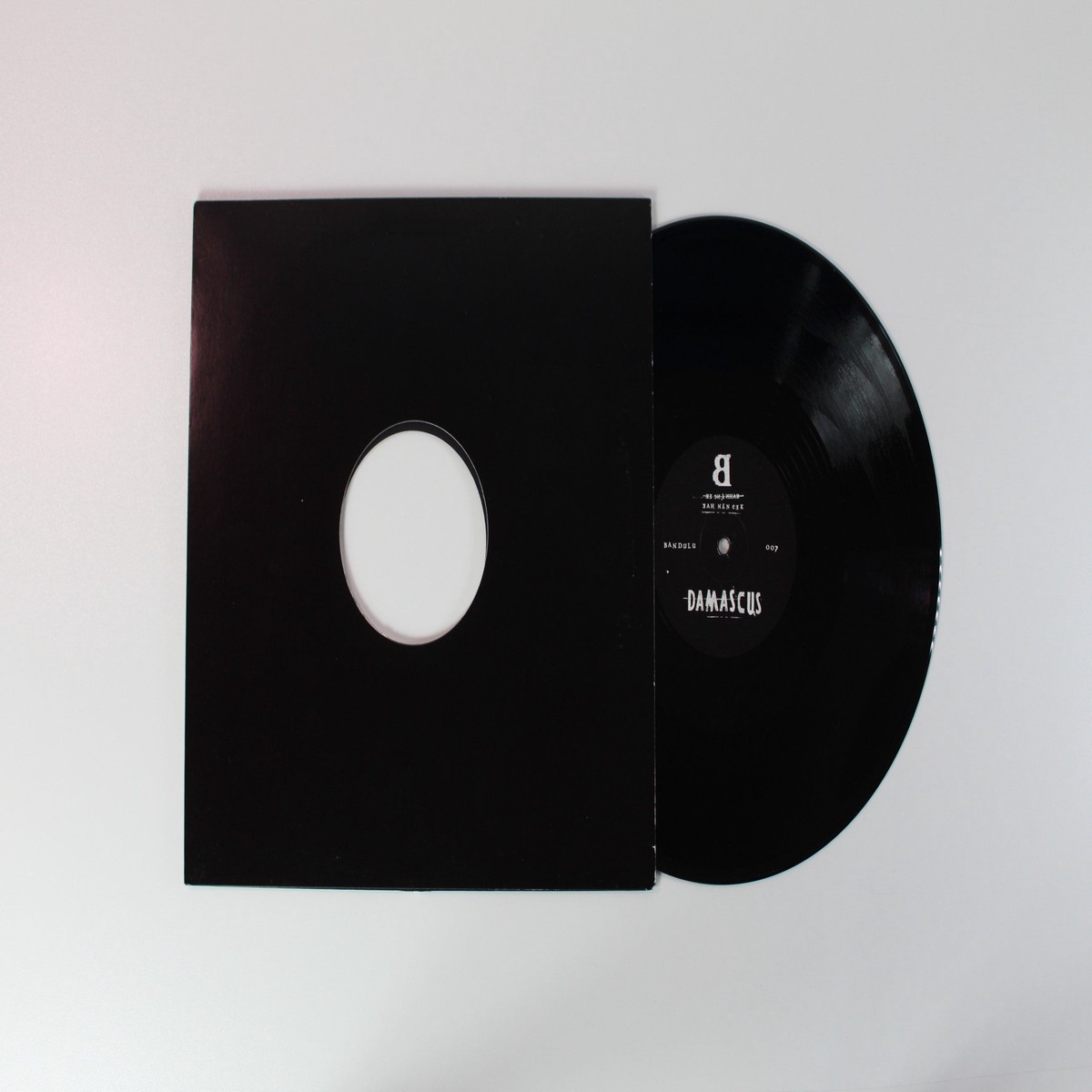 Kahn – Armed Dangerous on Bandulu Records 12 Single